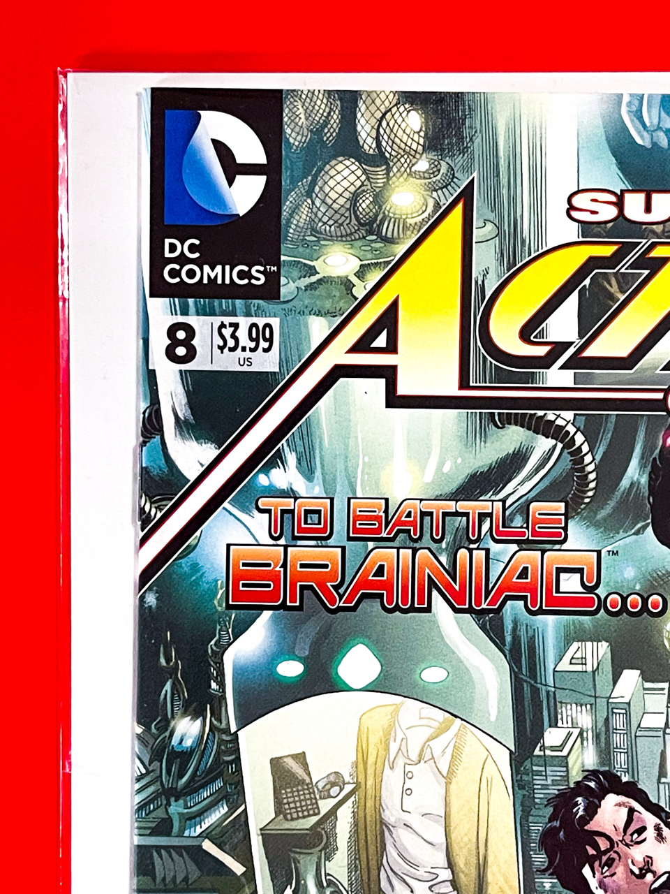 Top left corner of Action Comics #8 | Rags Morales Cover