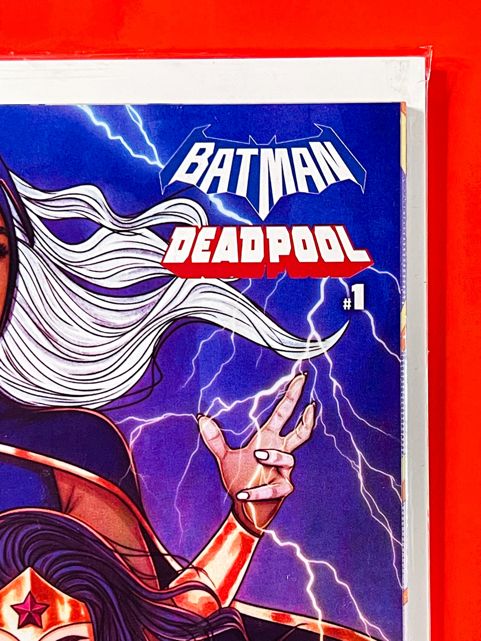 Top right corner of Batman & Deadpool #1 | Jenny Frison Cover