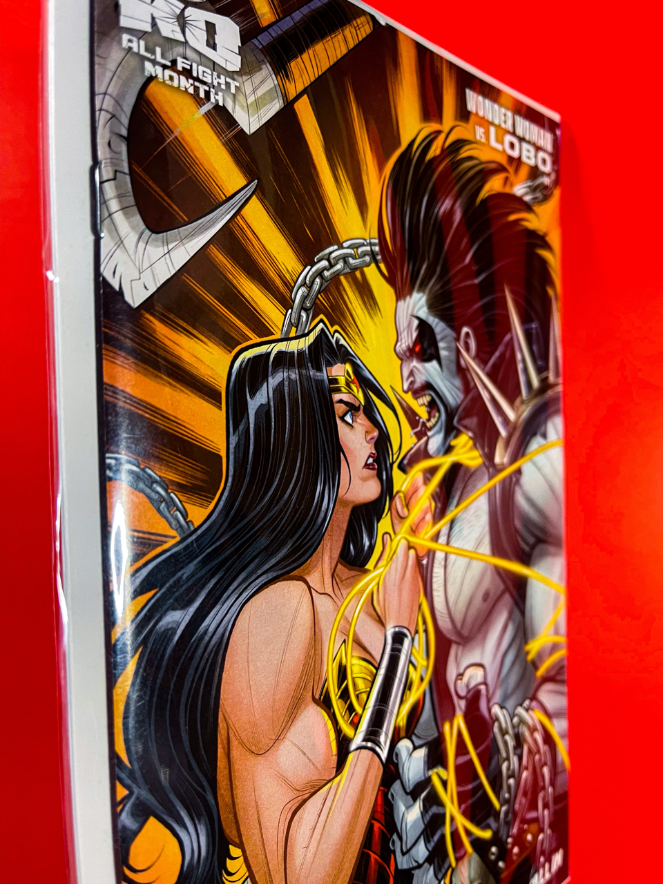 Spine of DC K.O Wonder Woman vs. Lobo #1 | Eddy Barrows & Eber Ferreira & Arif Prianto Cover