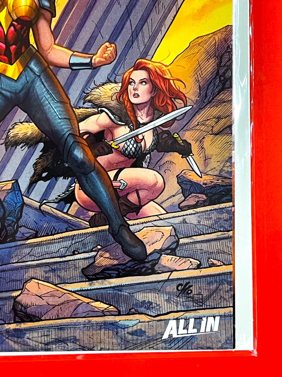 Bottom right corner of DC K.O Boss Battle #1 | Frank Cho & Sabine Rich Cover