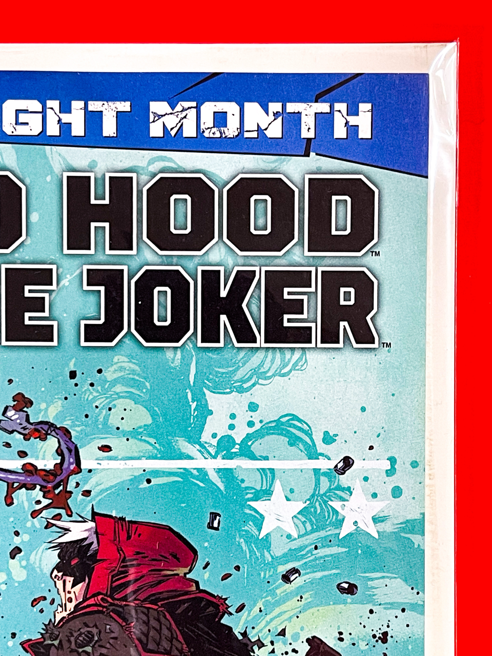 Top right corner of DC K.O: Red Hood vs The Joker #1 | Jorge Corona & Sarah Stern Cover