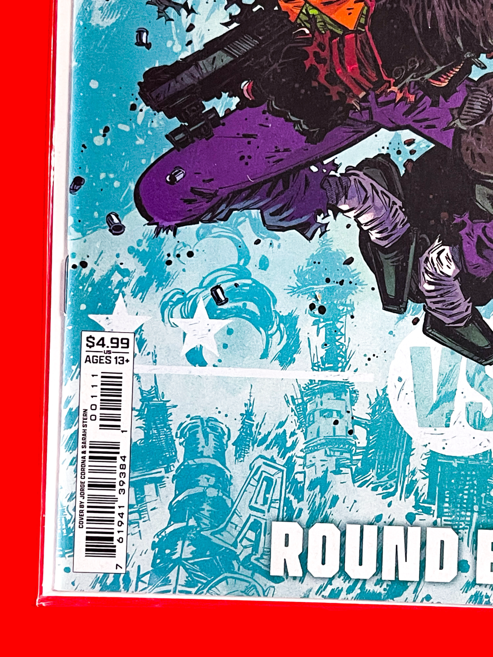 Bottom left corner of DC K.O: Red Hood vs The Joker #1 | Jorge Corona & Sarah Stern Cover