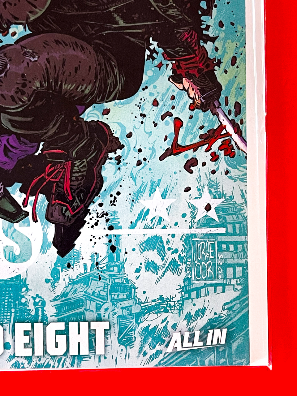 Bottom right corner of DC K.O: Red Hood vs The Joker #1 | Jorge Corona & Sarah Stern Cover