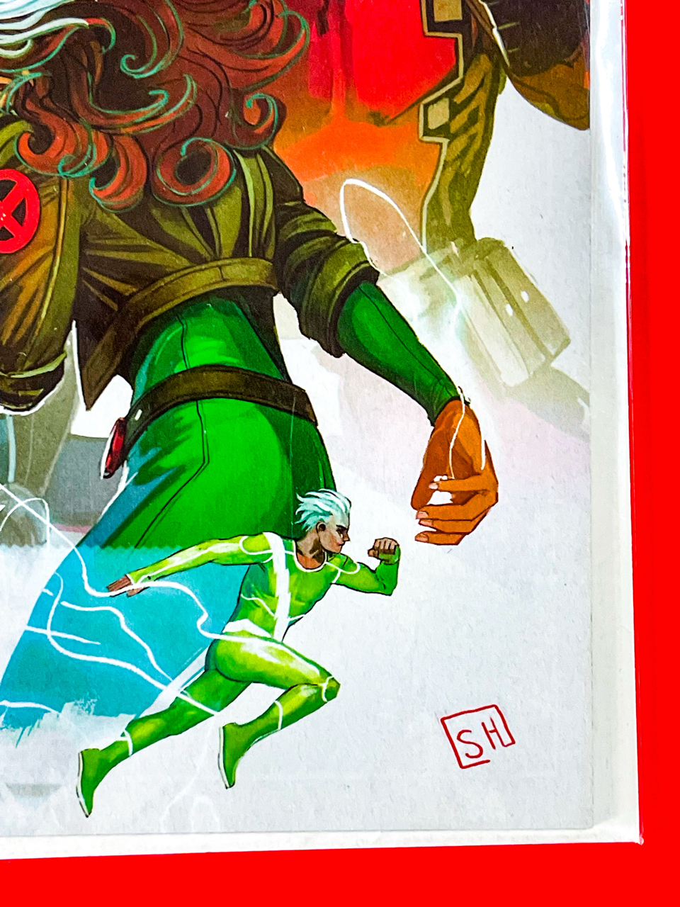Bottom right corner of Uncanny Avengers #5 | Stephanie Hans Cover