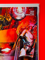 Top right corner of Justice League Unlimited #16 | John Giang Cover