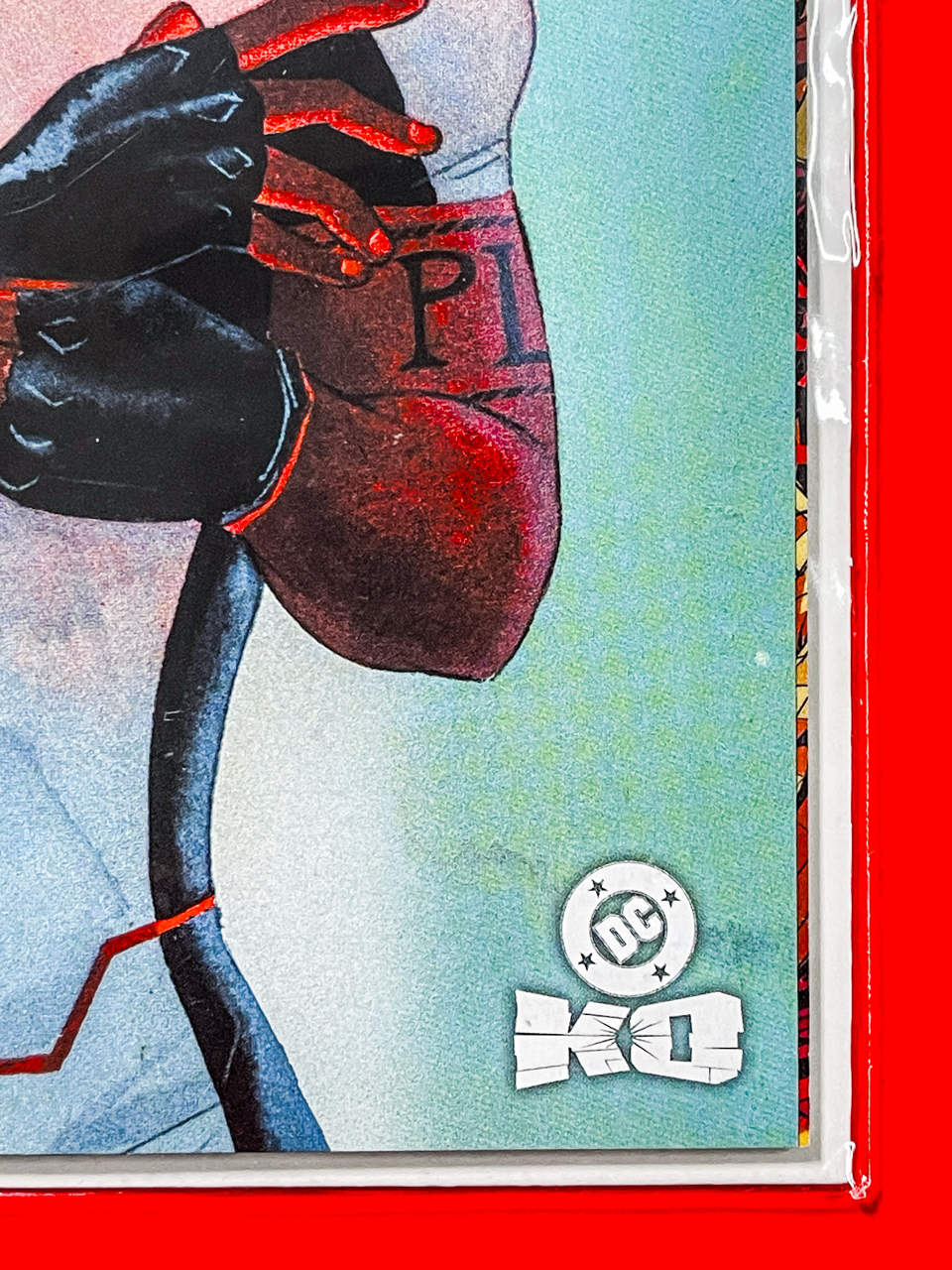 Bottom right corner of Justice League Unlimited #15 | Kevin Wada Cover