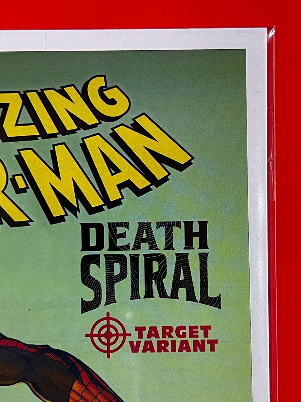 Top right corner of The Amazing Spider-Man #23 | Mark Bagley Cover