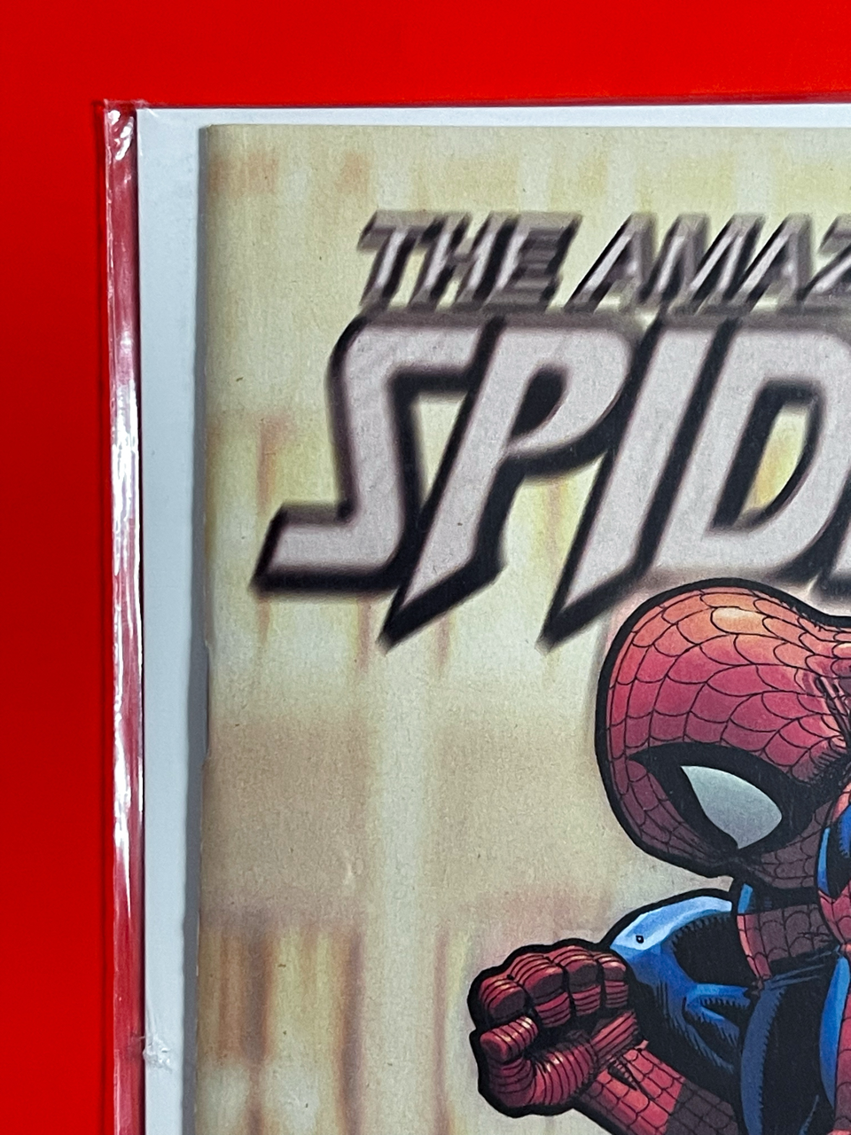 Top left corner of The Amazing Spider-Man #93 | Arthur Adams Cover