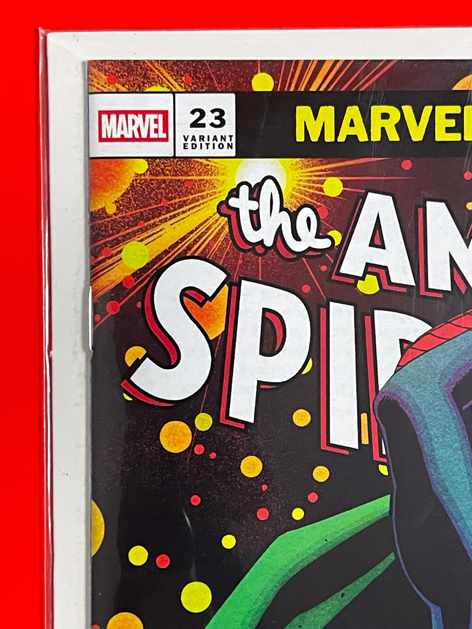Top left corner of The Amazing Spider-Man #23 | Mike McKone Cover