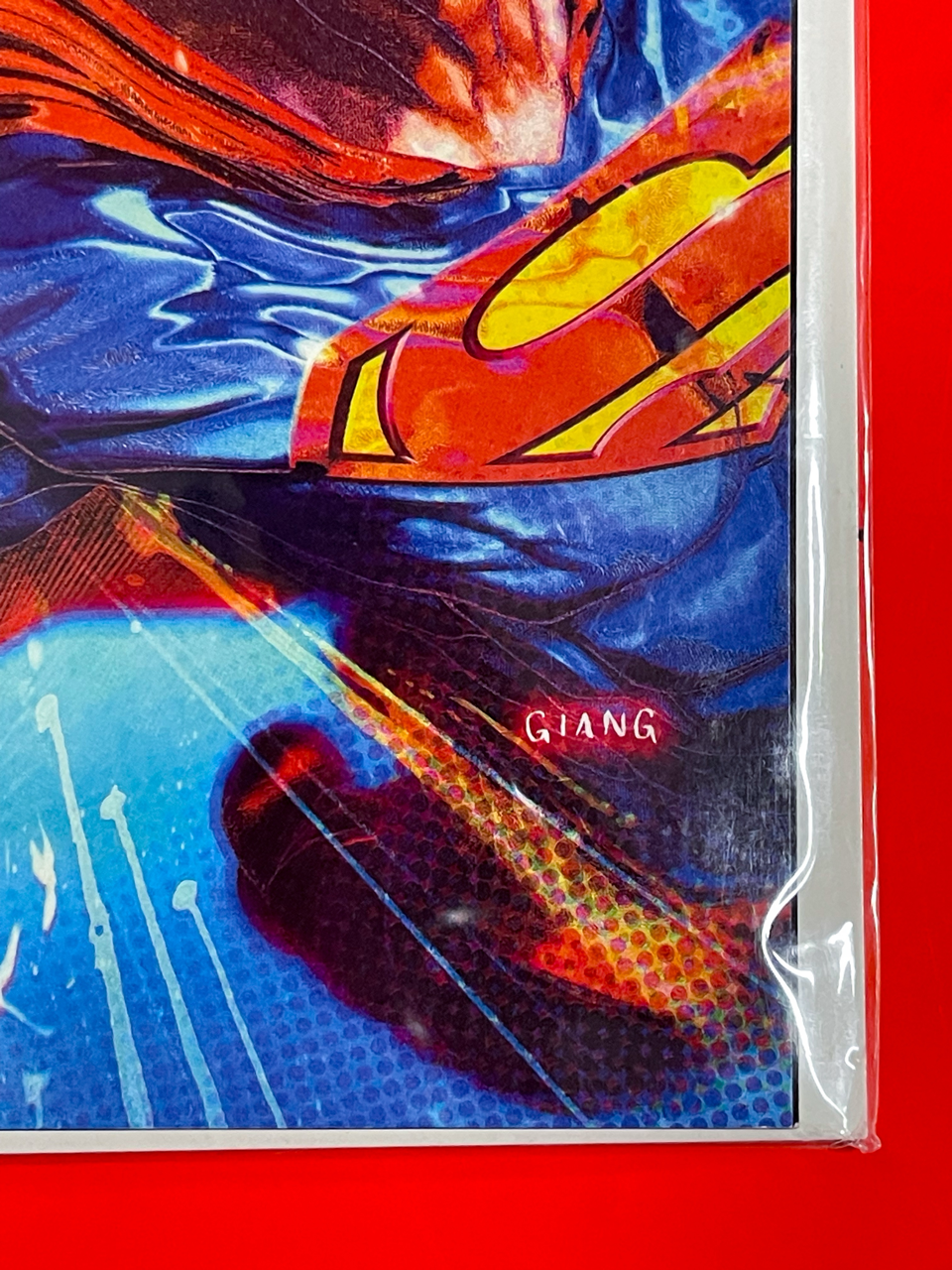Bottom right corner of Superman & Spider-Man #1 | John Giang Cover