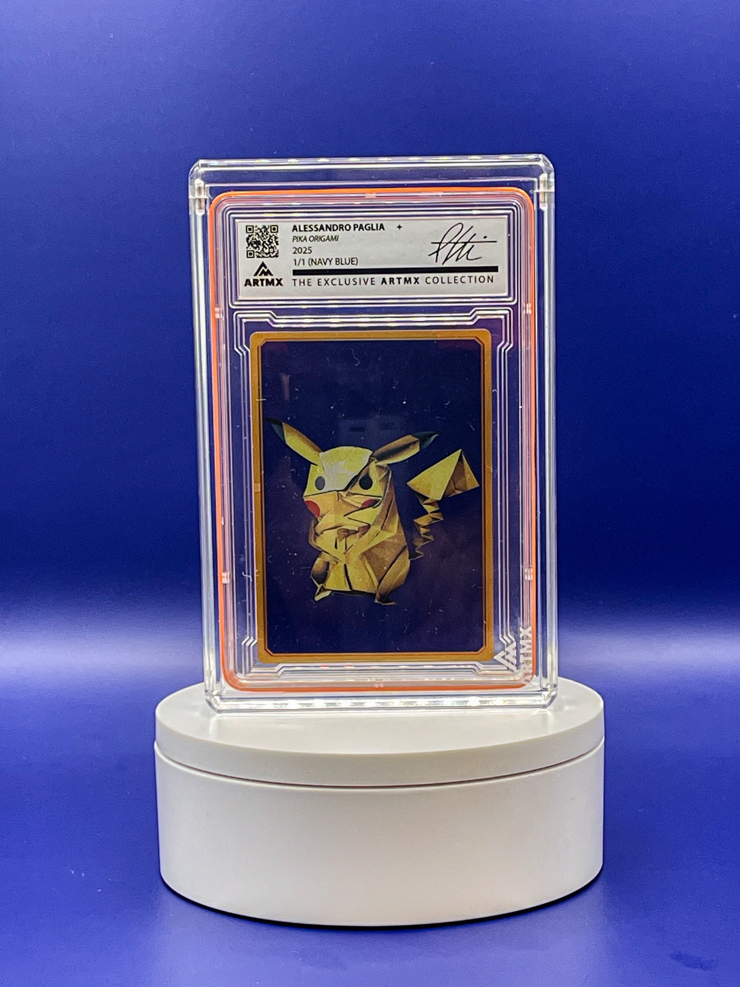 Collectible card featuring Pikachu in a clear protective case on a blue background