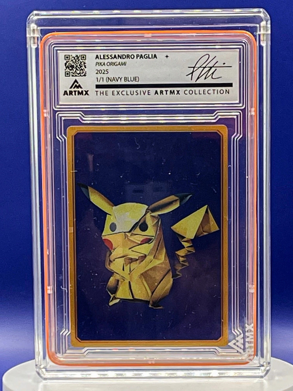 Origami Pikachu card in a protective case with Artmx branding