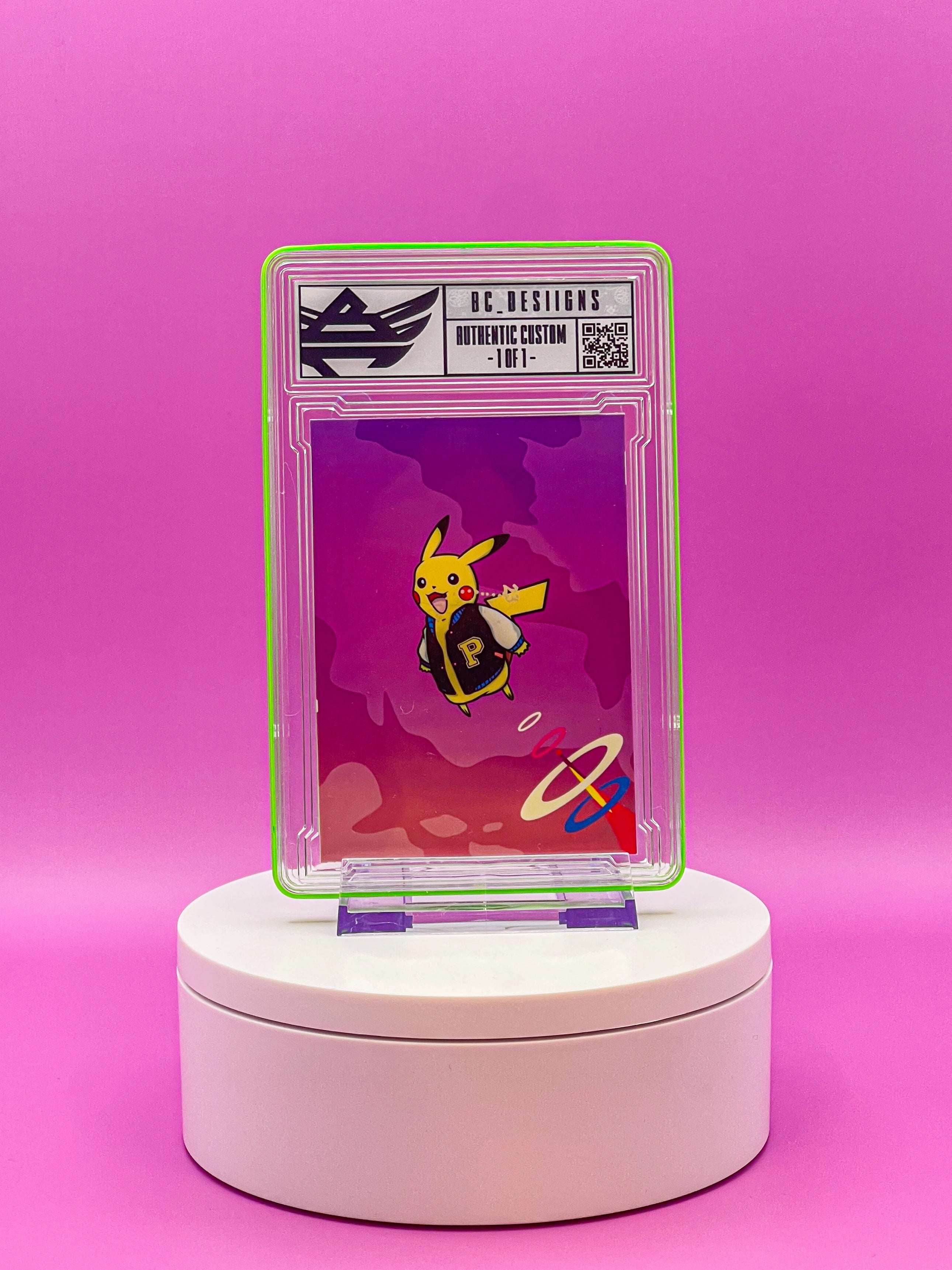 Trading card in a protective case on a pink background