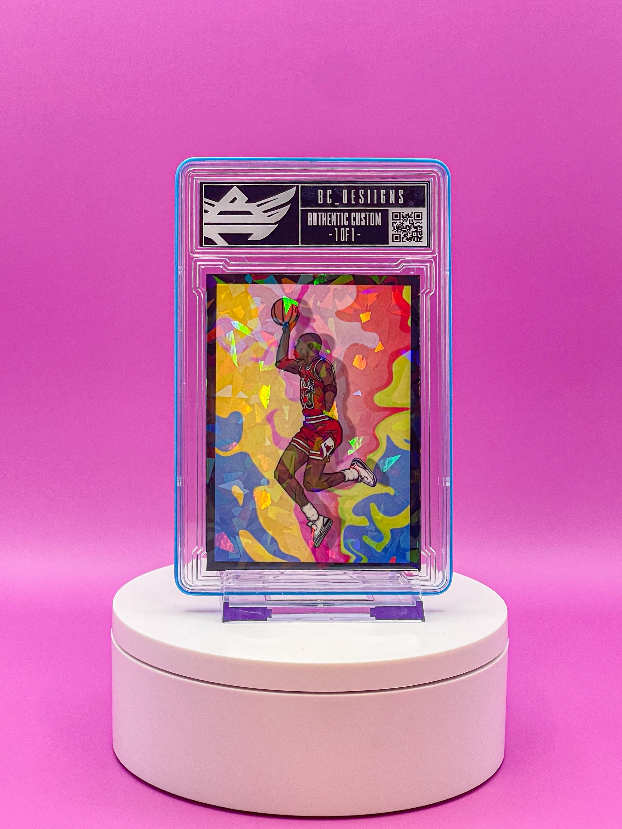 Collectible card on a white stand against a pink background