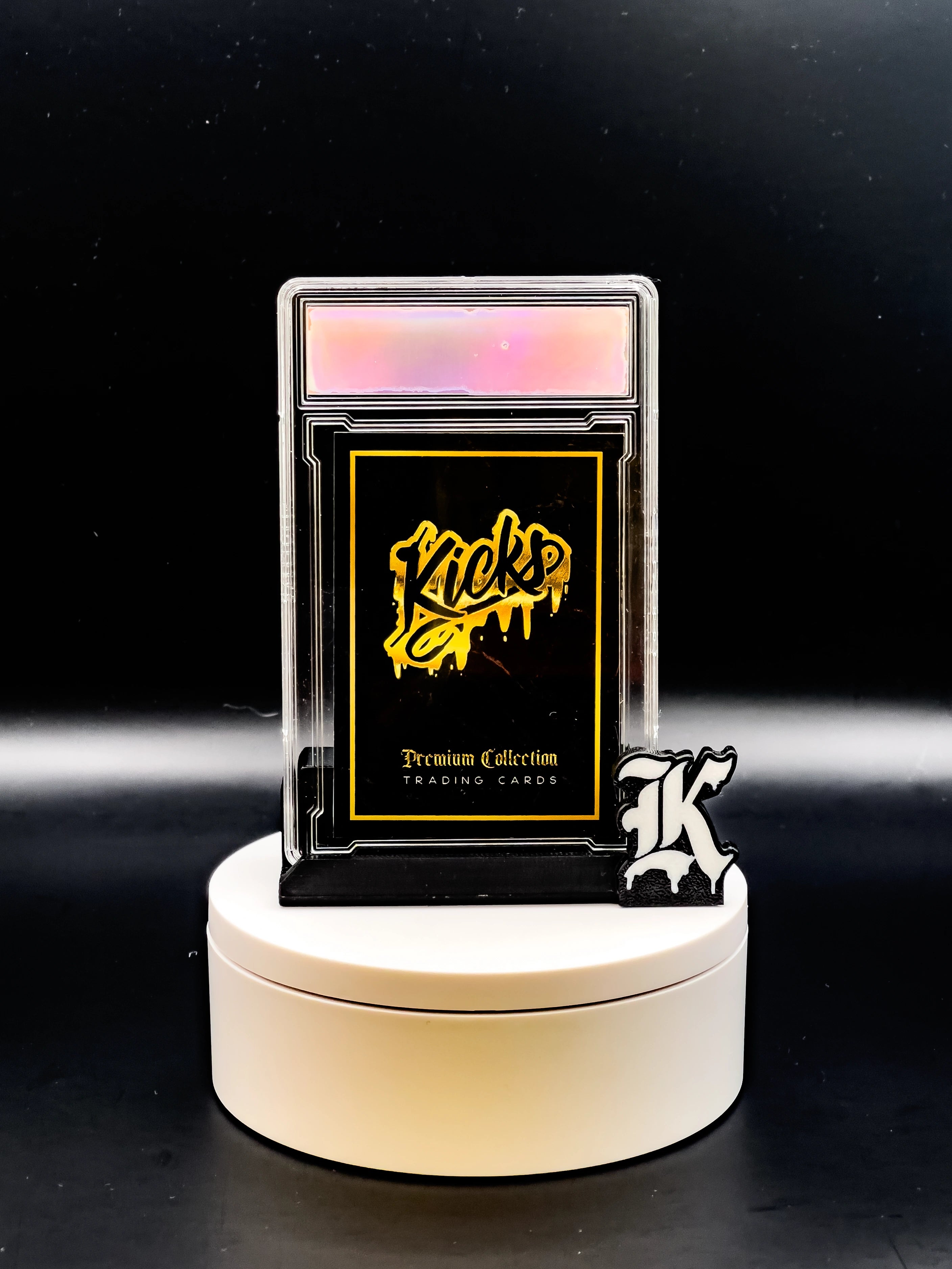 Trading card display with 'Kicker' branding on a black background