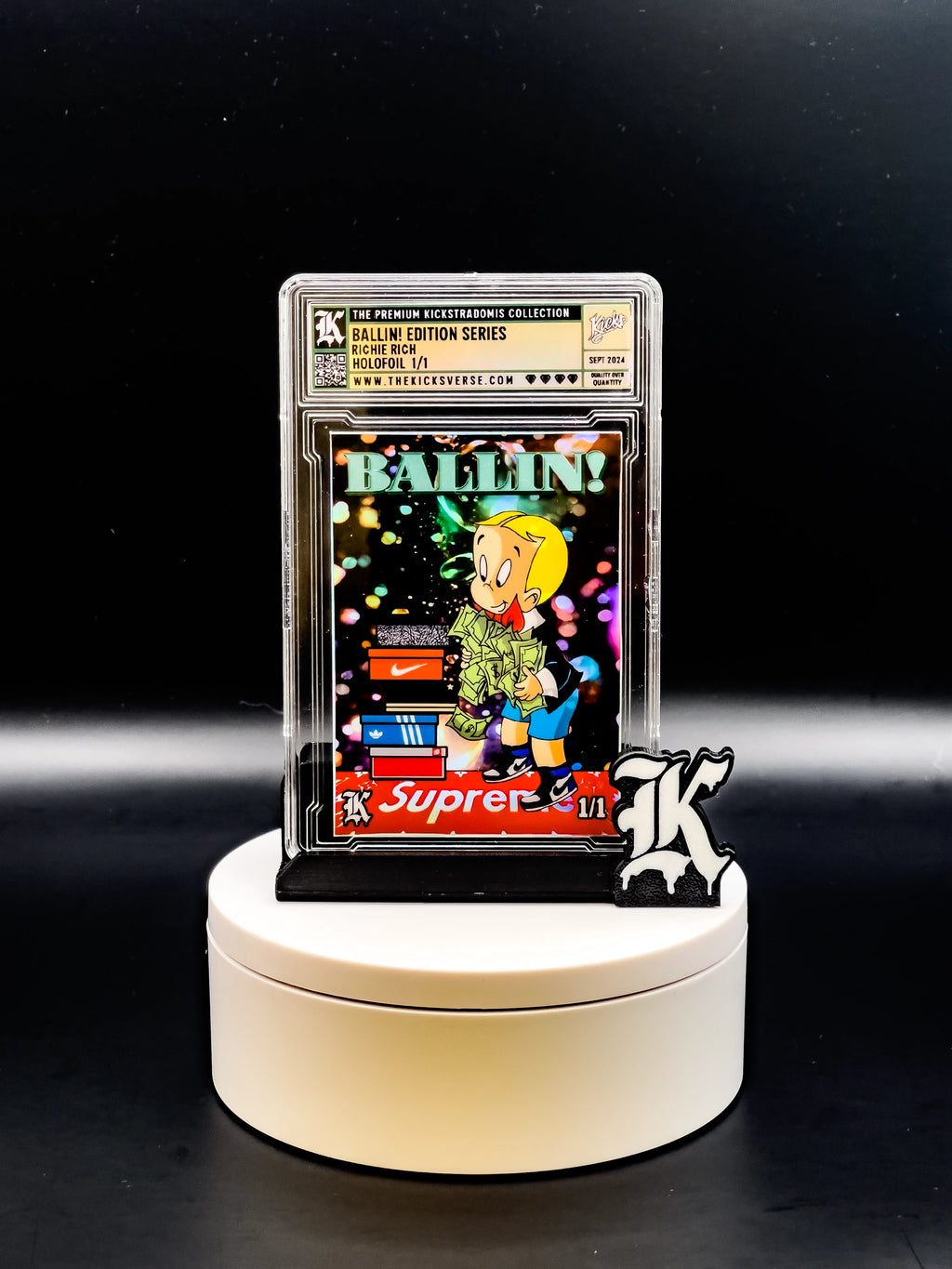 Trading card on a stand with a black background