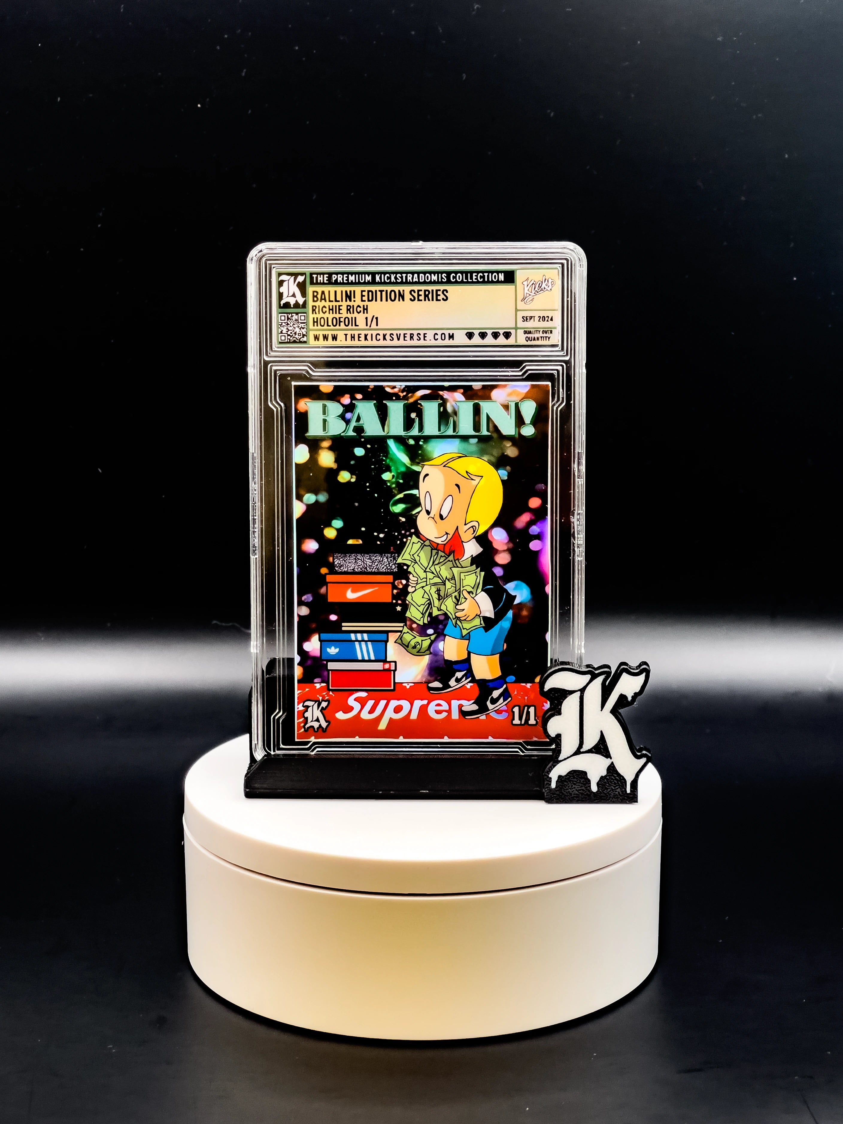 Trading card on a stand with a black background