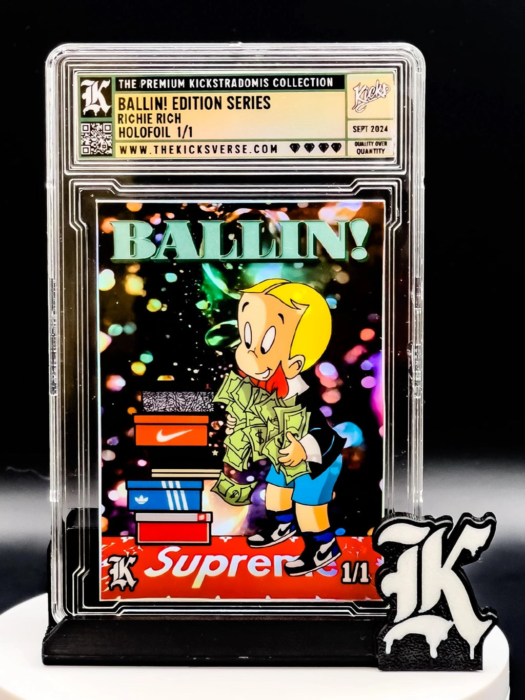 Trading card featuring a character with 'Ballin!' text and 'Supreme' branding, displayed in a protective case.