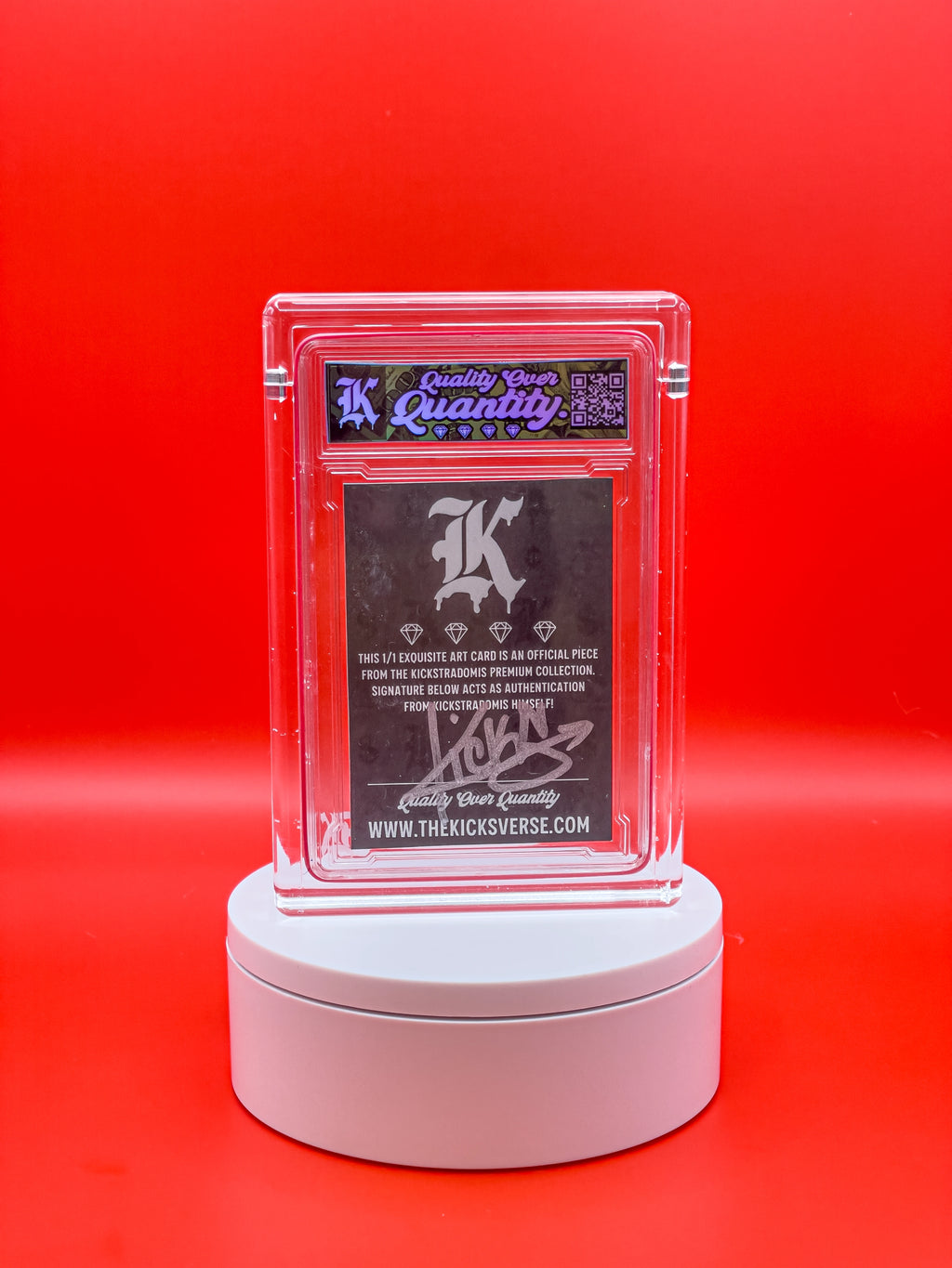 Card in a clear plastic holder on a red background