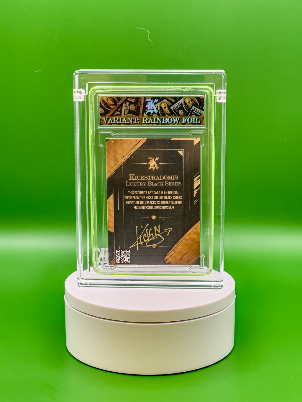 Collectible card in a clear display case on a green background