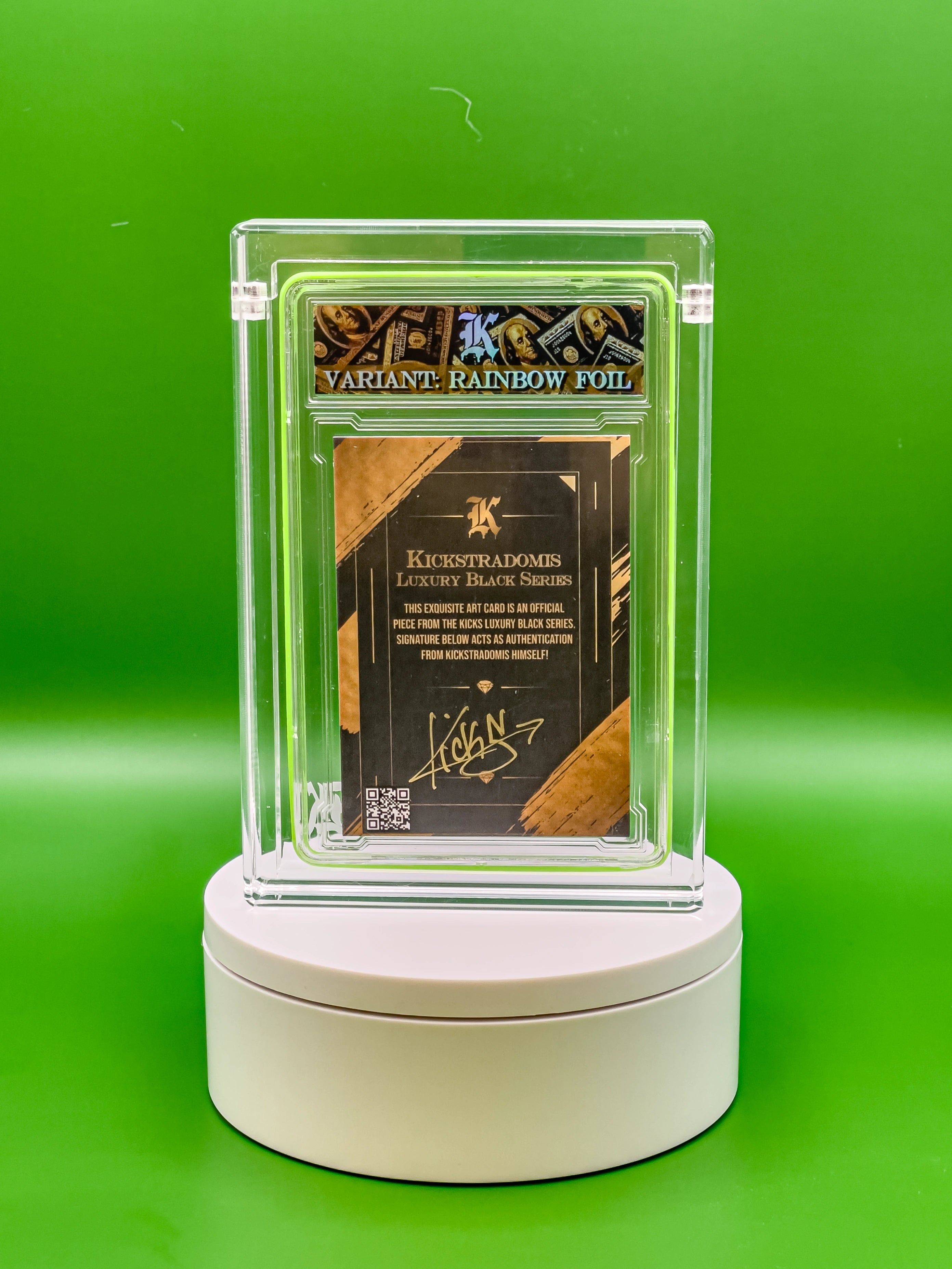 Collectible card in a clear display case on a green background