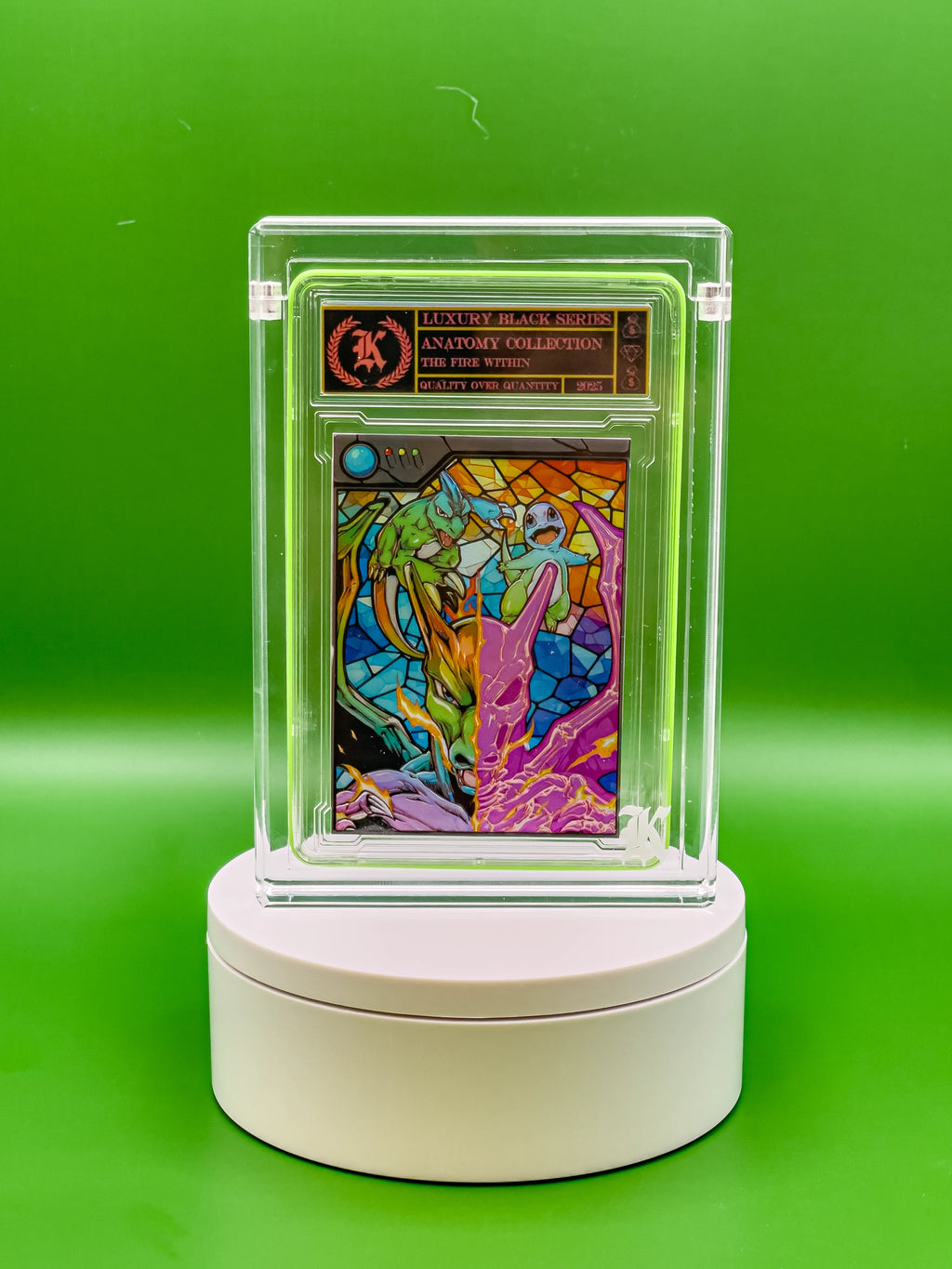Collectible card in a clear display case on a green background