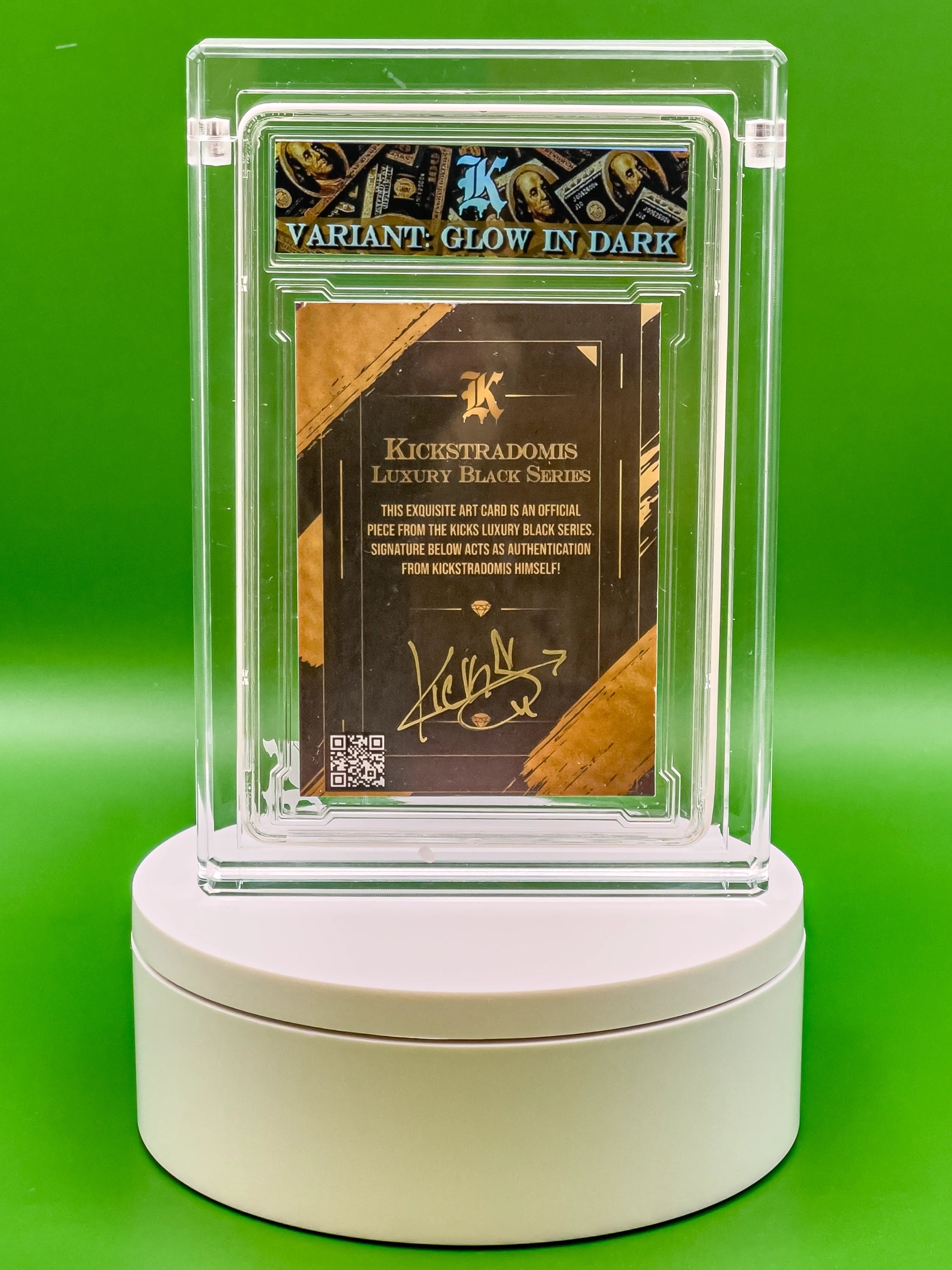 Collectible card in a clear display case on a green background