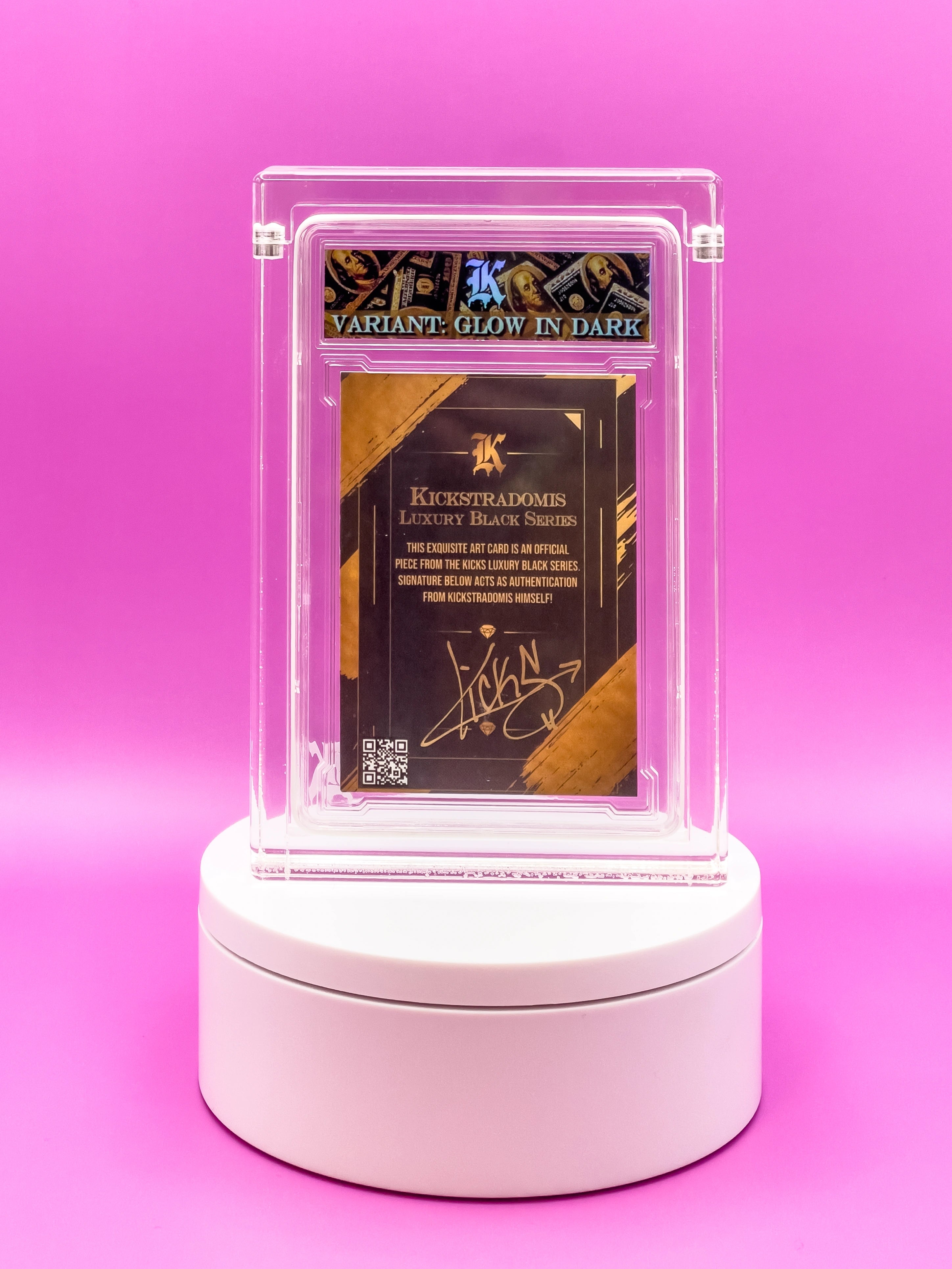 Collectible card in a transparent display case on a pink background