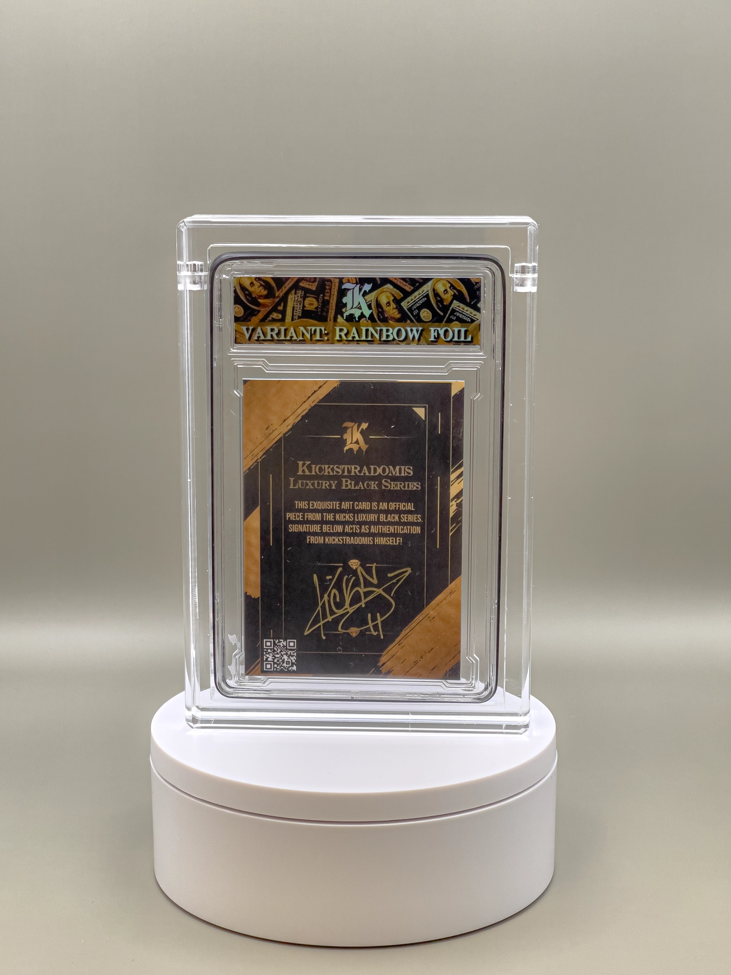 Collectible card in a clear protective case on a white stand against a gray background