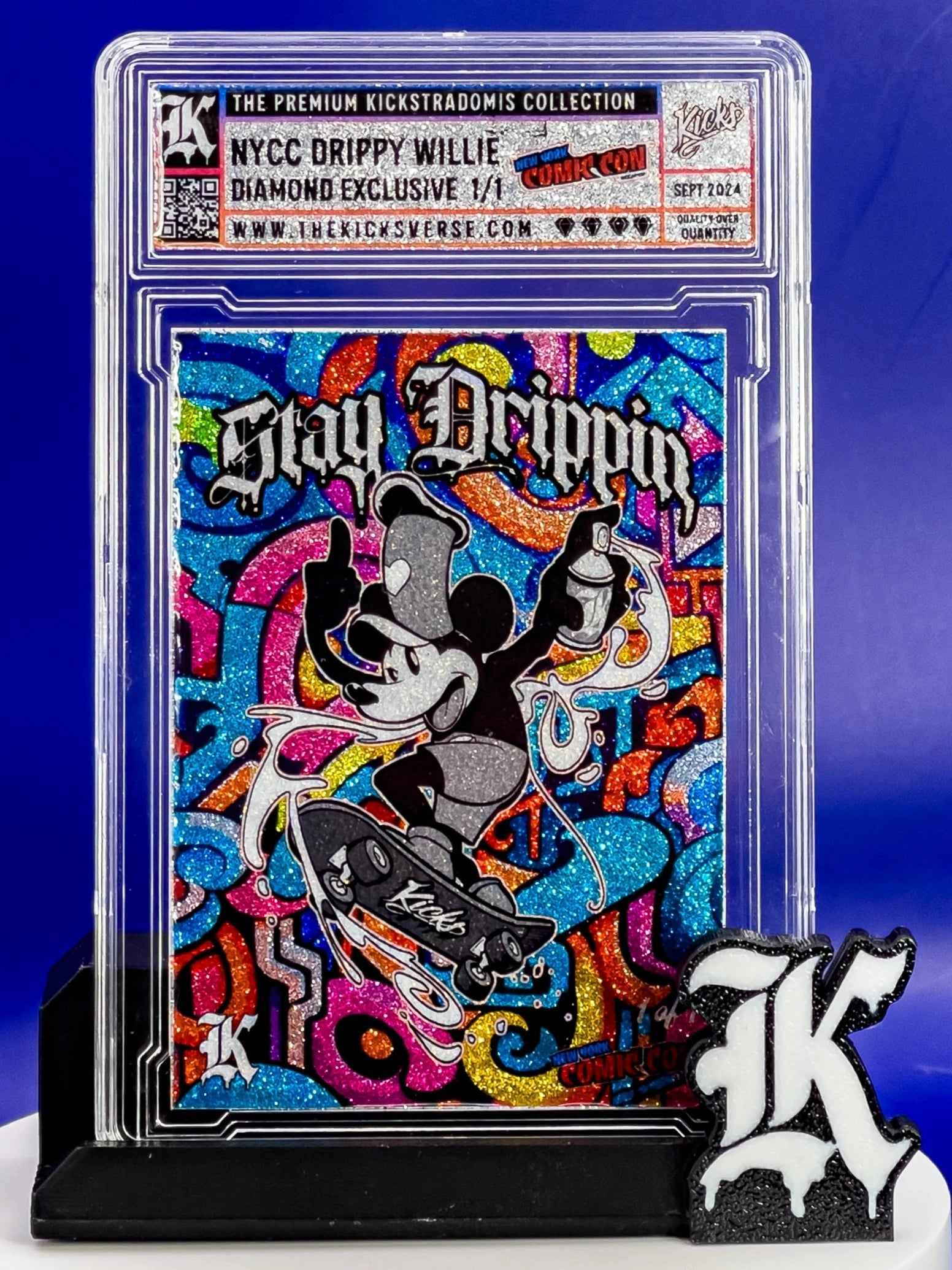 Colorful card featuring a stylized character with text 'Stay Drippin'' in a premium packaging.